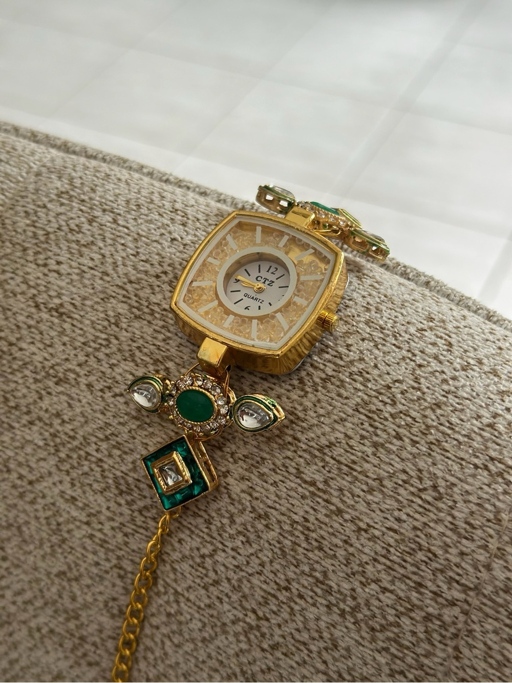Gold-Tone Women's Bracelet Watch with Green Stone Accents